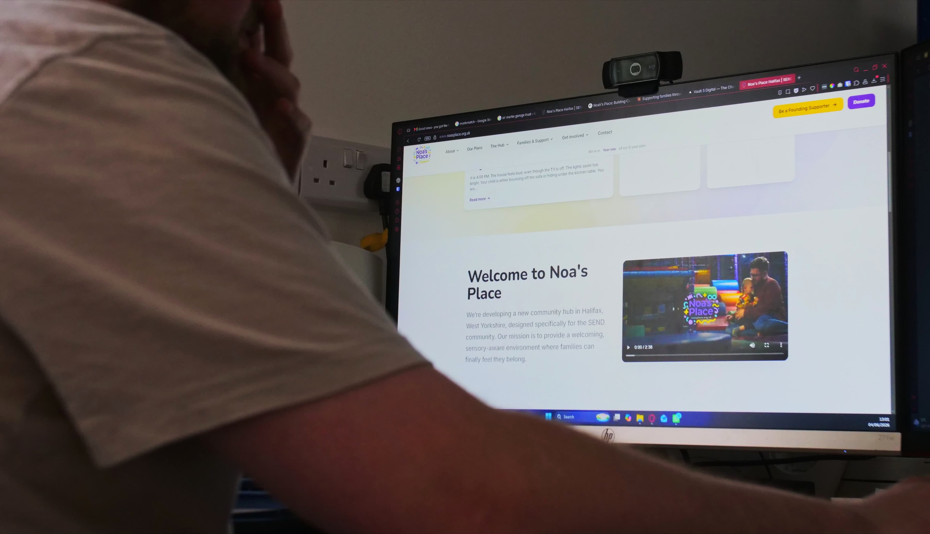 Josh reviewing a charity website built by Vault 5 Digital