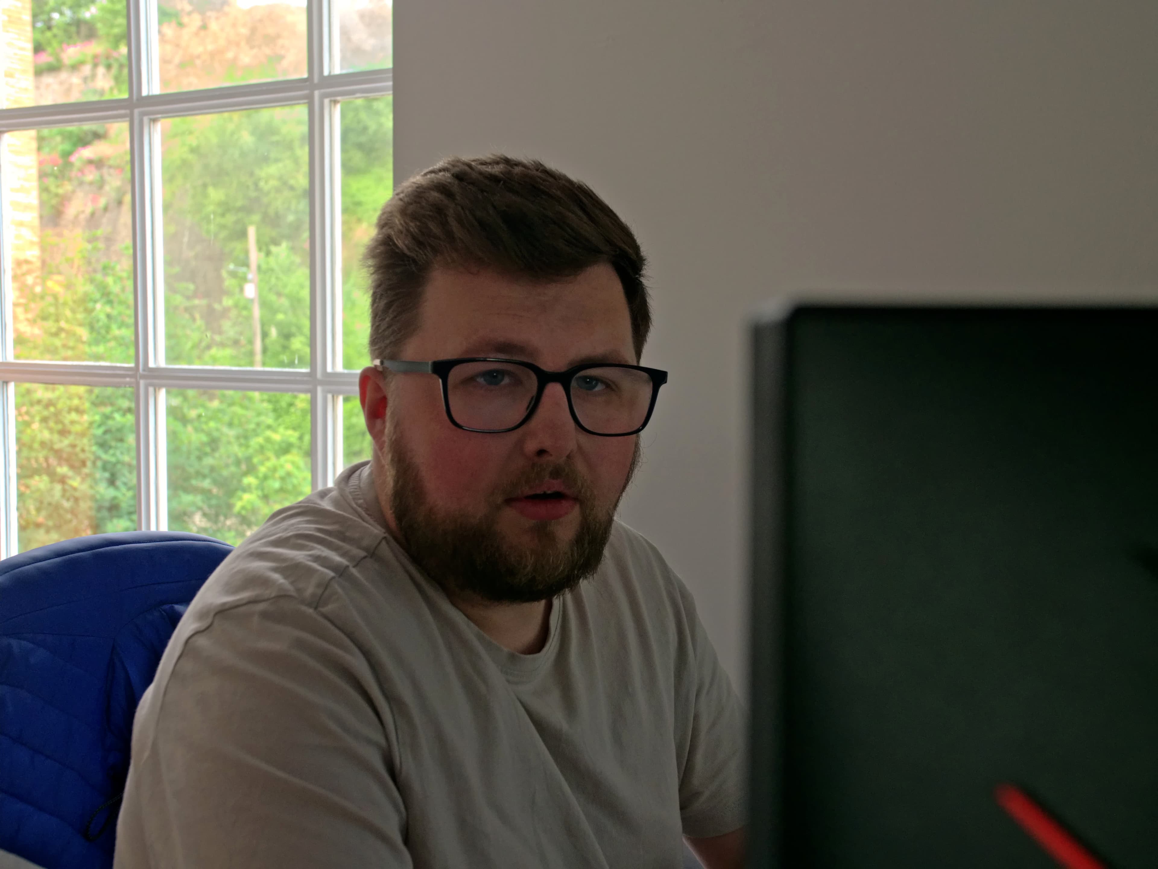 Josh working on a charity website at Vault 5 Digital
