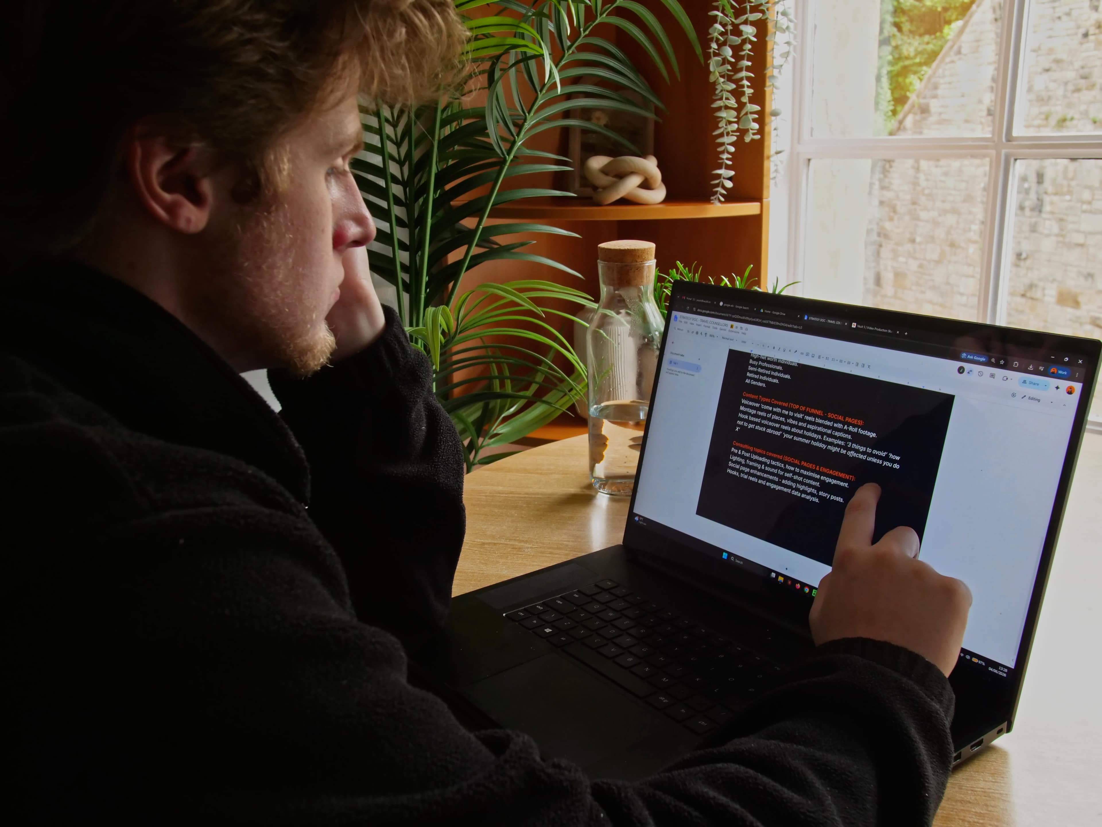 Josiah in pre-production planning for a charity film